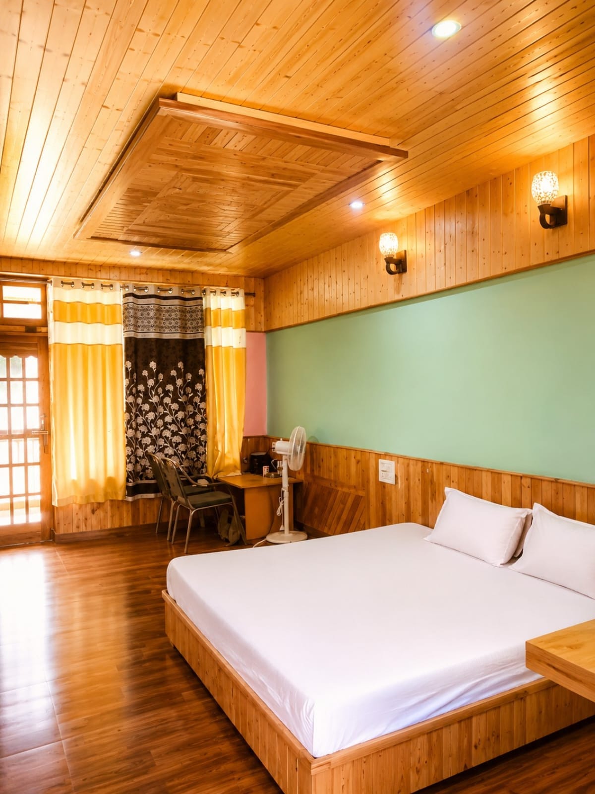 Bedroom and sitting area at Sunset Homestay